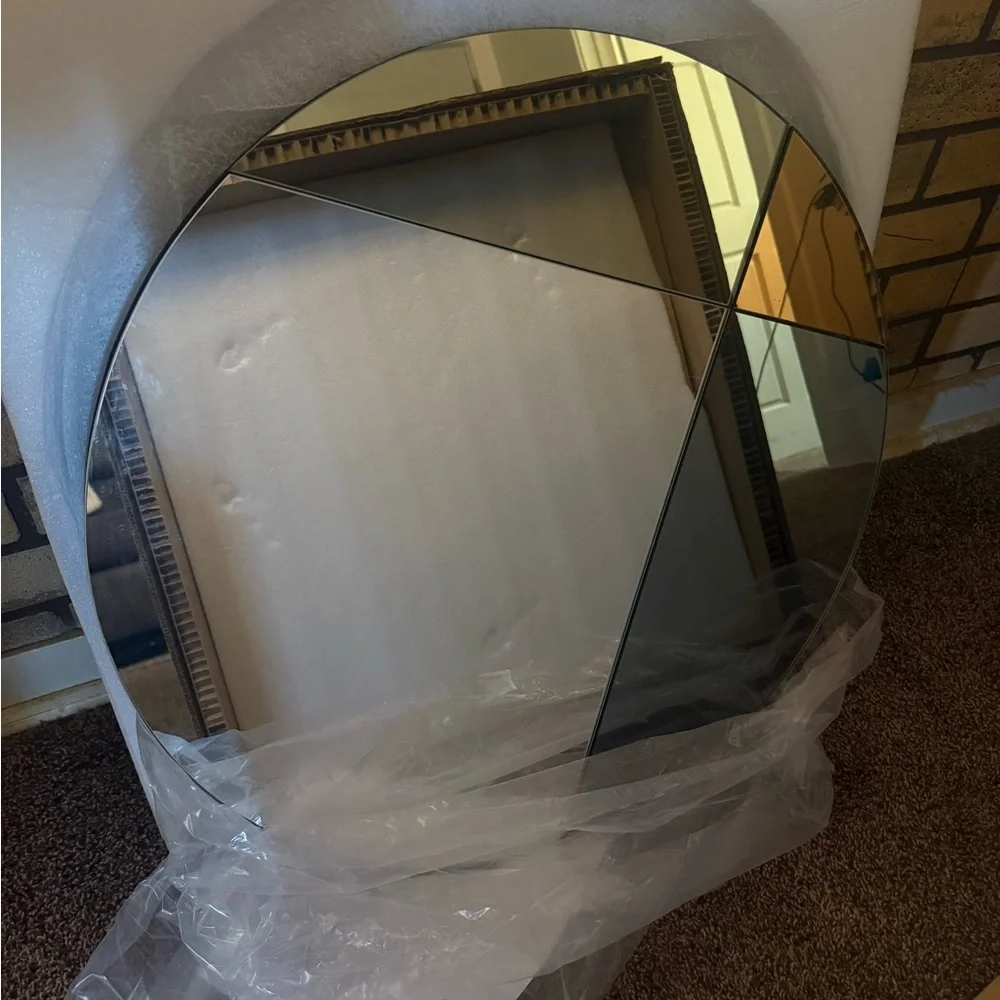 Modern Round Wall Mirror with Black and Gold Accents